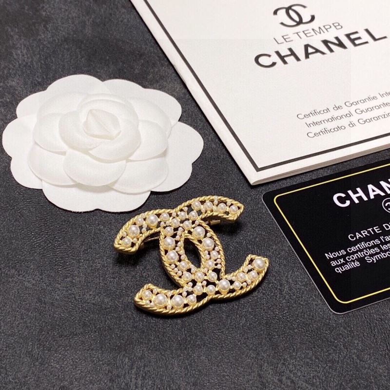 Ch*el brooches